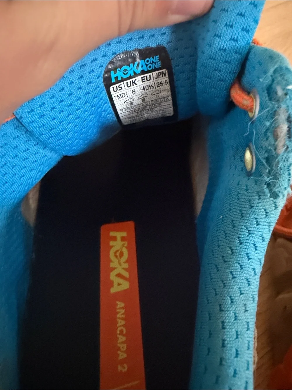 Hoka Kids Tan Sneakers with Bright Blue Lining and Orange Laces